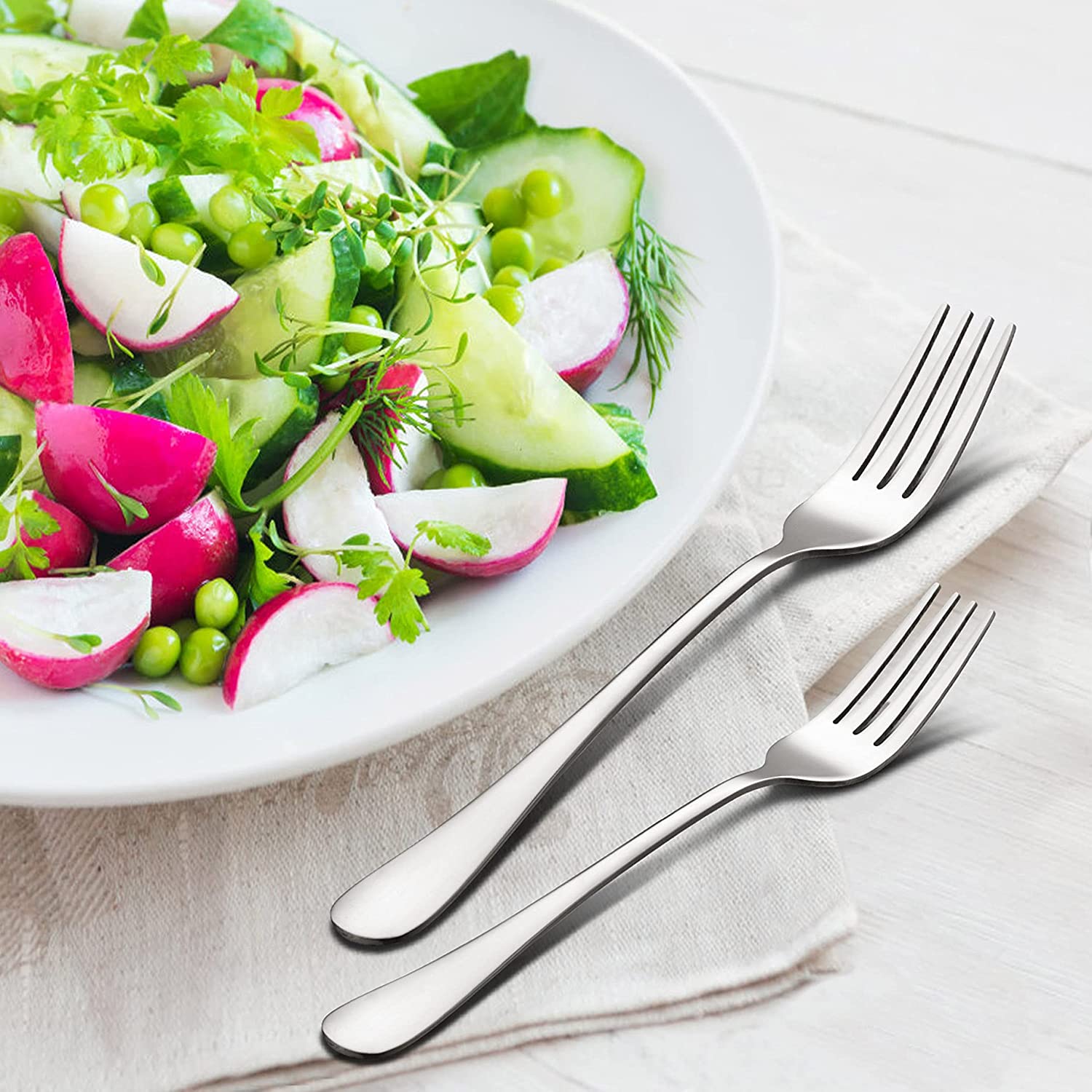 Stainless steel cutlery set for 4 people, including knife, fork and spoon, mirror polished